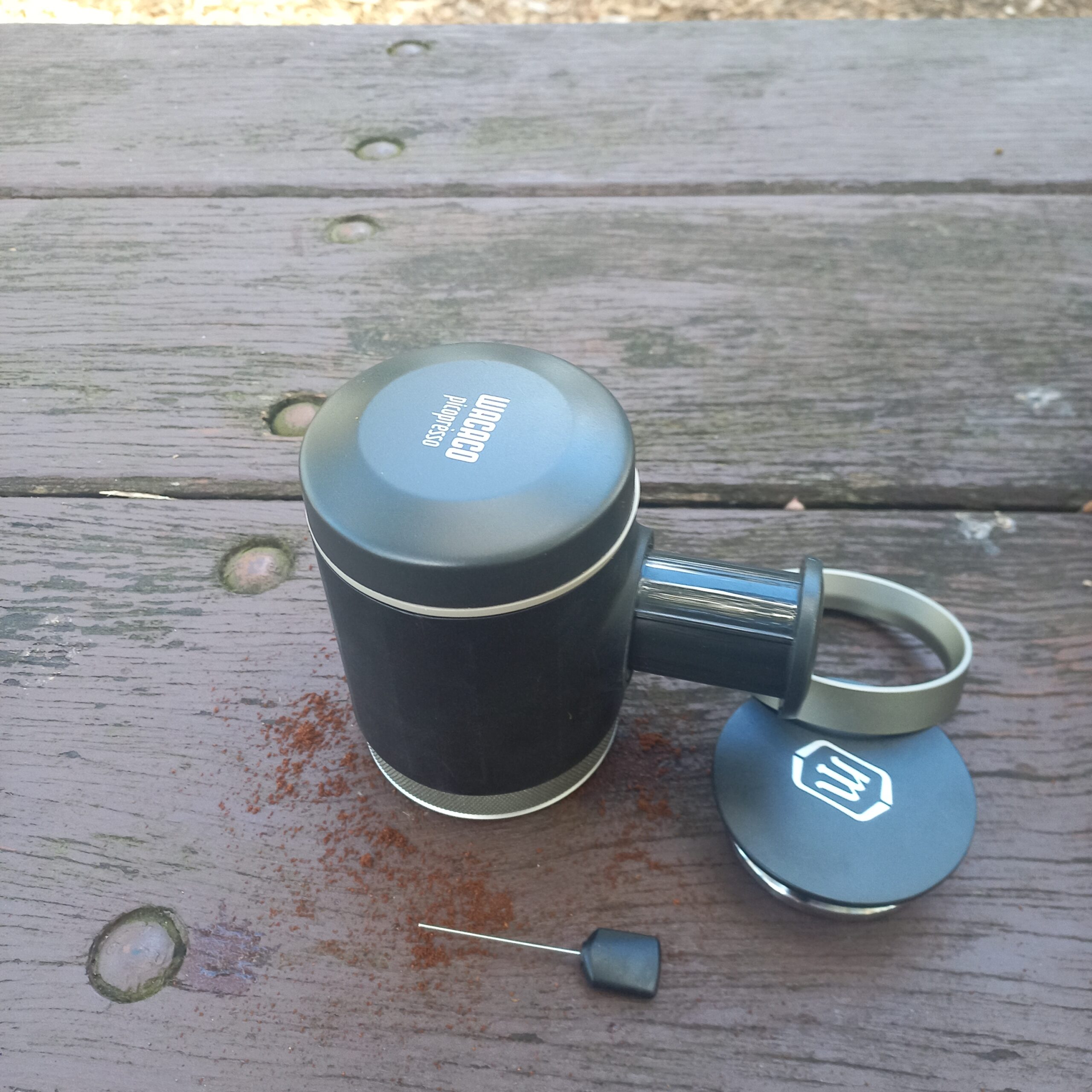 Portable espresso maker Wacaco Picopresso on the table